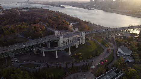 overpass at sunset near a wide river