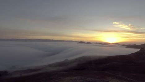 stunning sunset over a sea of clouds