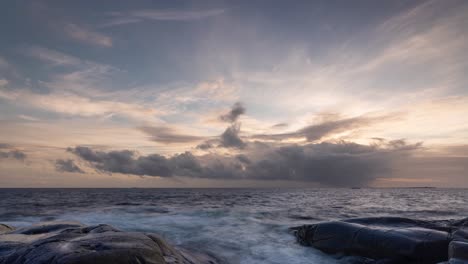 rocky seacoast of norway at winter sunset, time lapse video