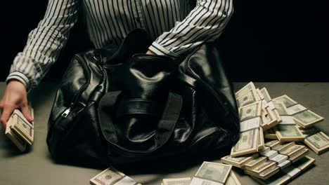 specialised police officer counting dollar banknotes in crime lab, conceptual image. high quality 4k footage