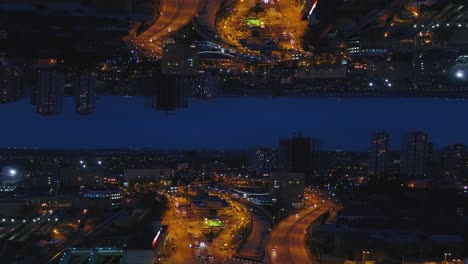 inverted cityscape at night