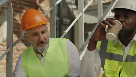 construction workers discussing on a site