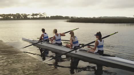 Female-rowing-team-training-on-a-river