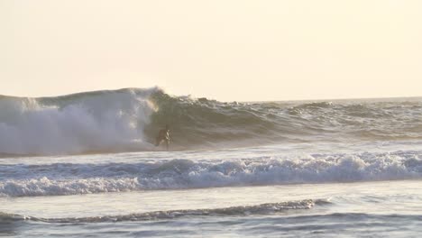 slow motion shot of a man surfing