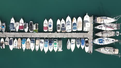 soaring drone shot of a harbor in gran canaria, spain