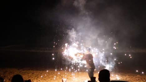 fire show on the beach at night