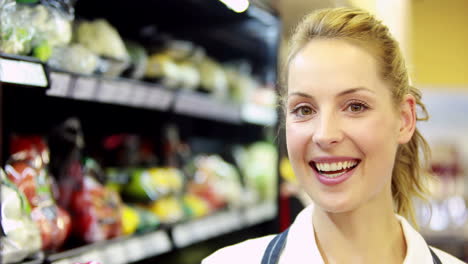 young happy woman holding pepper