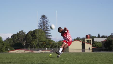 rugby player throwing the rugby ball