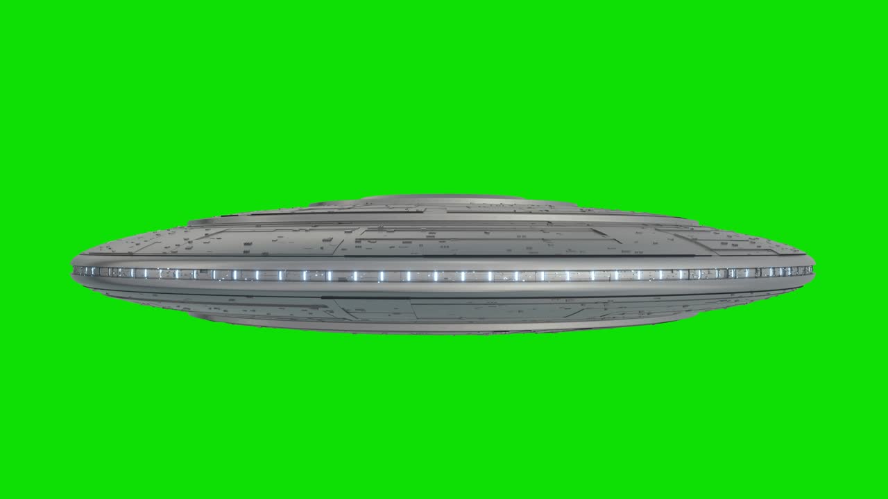 UFO - Flying Saucer with Blue lights rotating isolated on green screen background