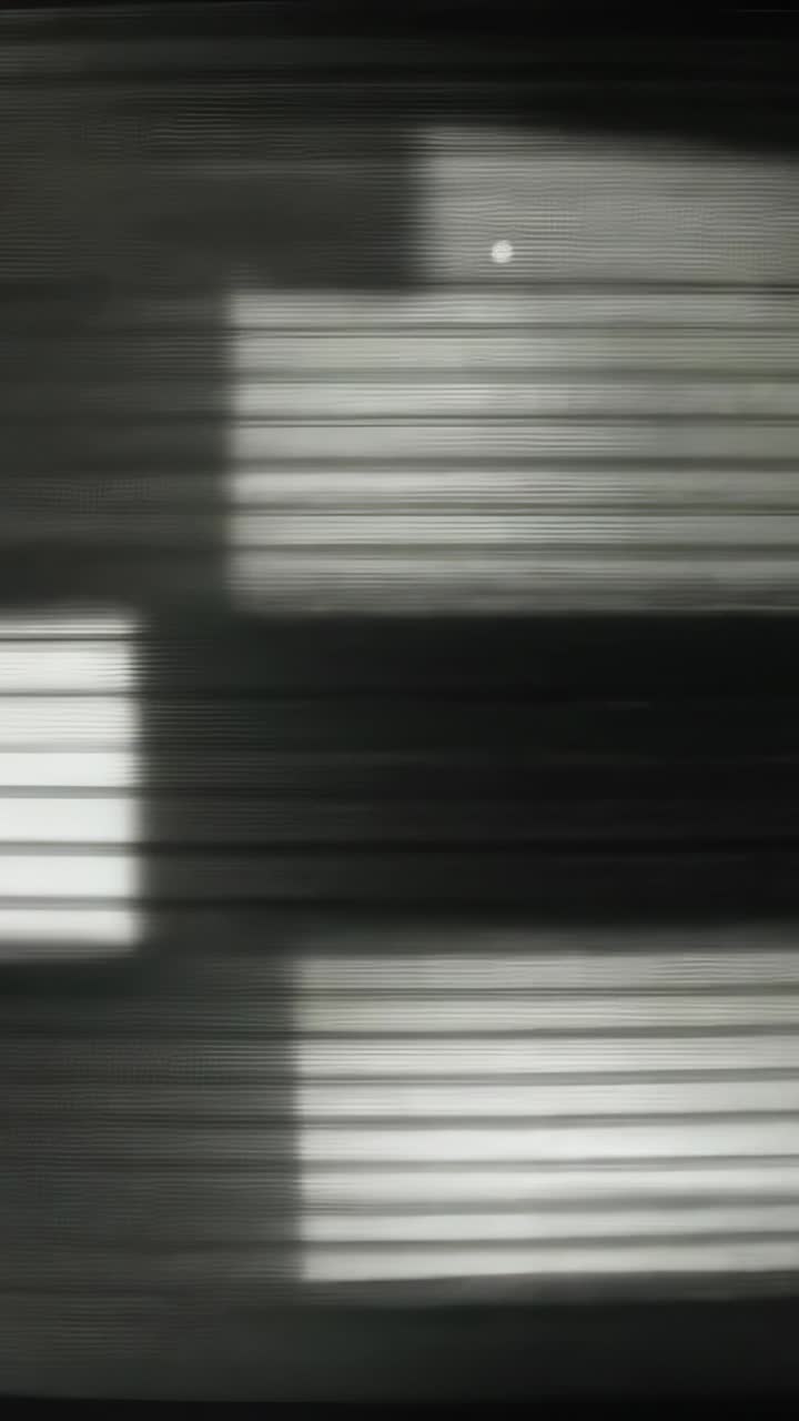 Vertical video: Appearing bright dot causing striped bands shifting in tall frame showing scan blur