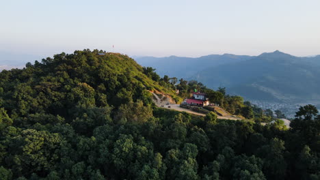 mountain lodge on lush green hill in pokhara, nepal