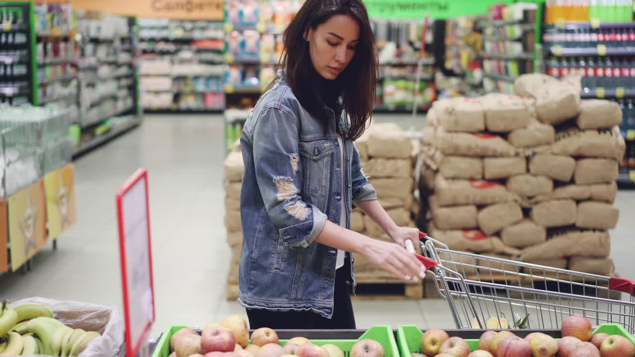 Woman Shopping for Fruits in a Supermarket