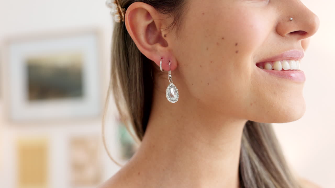 Woman, luxury and diamonds ear ring jewelry