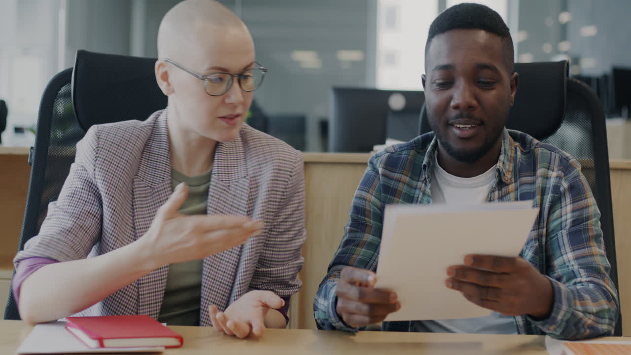 Business Colleagues Reviewing Financial Report