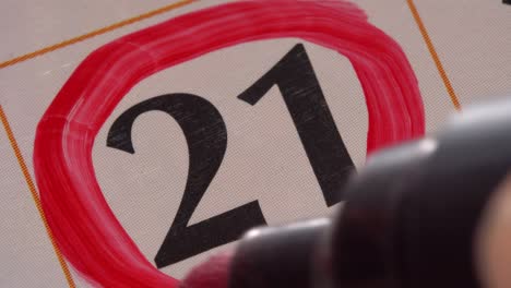 marking the date in the calendar with a red marker