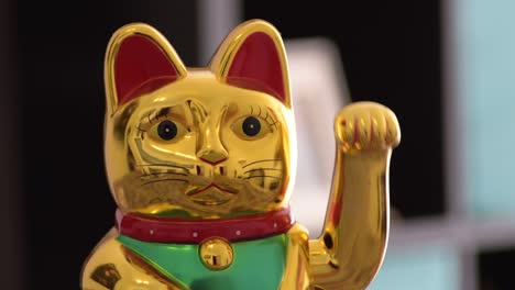 maneki neko moving the arm, chinese lucky cat