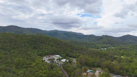 scenic landscape with dam and lush greenery