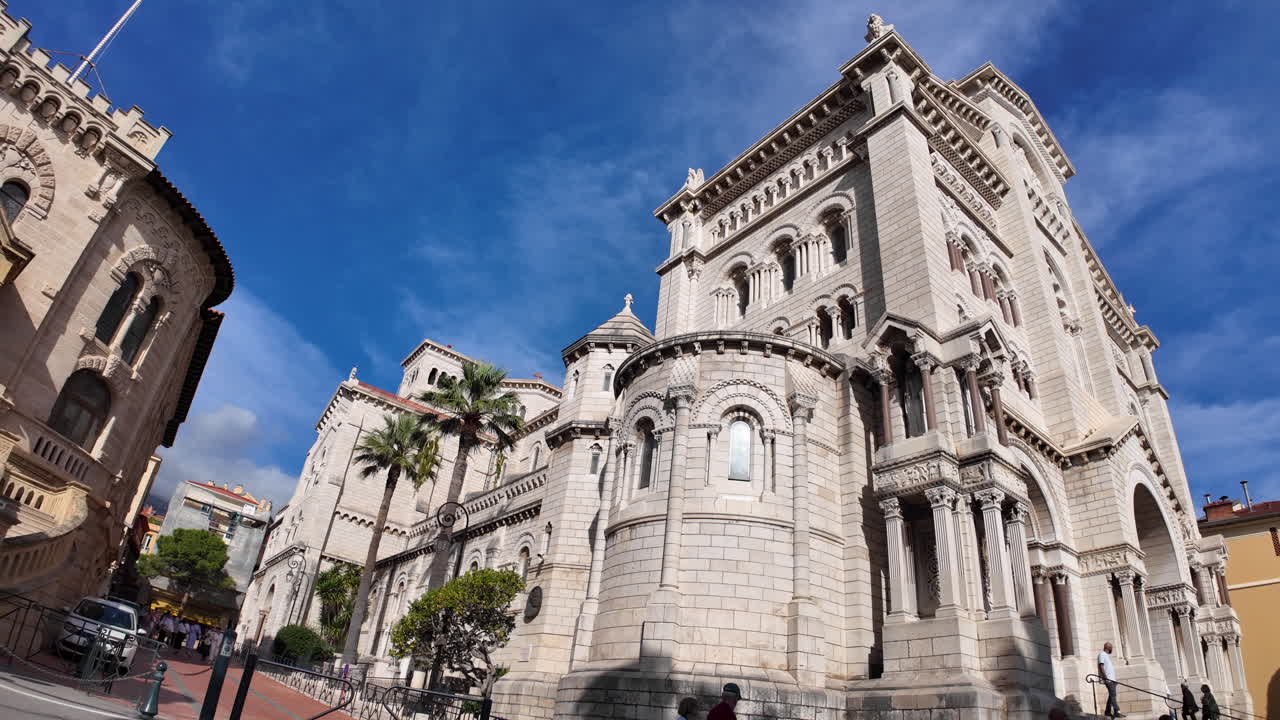 Monaco City, Monaco - July 18, 2025: View of the facade of the Cathedral of Our Lady Immaculate under the blue sky