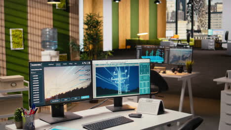power line tower cad design displayed on dual monitors in engineering office