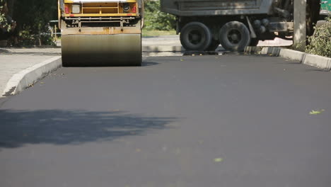 road roller working on a gravel