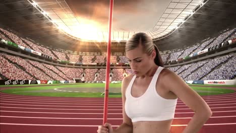 Female-athlete-standing-with-javelin-throw