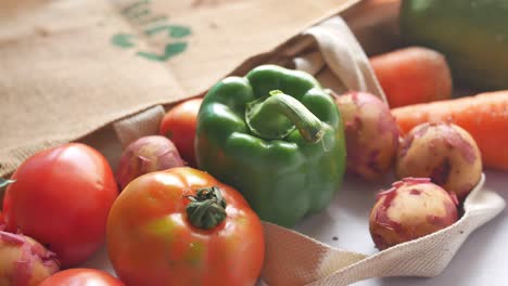 fresh vegetables in a reusable shopping bag