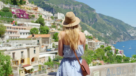 woman enjoying the view of positano, italy