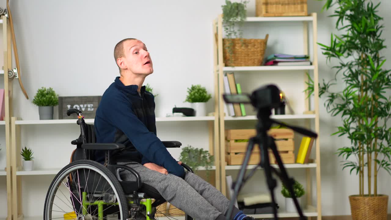 Man in Wheelchair Vlogging Indoors