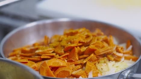 cooking vegetables in a pan
