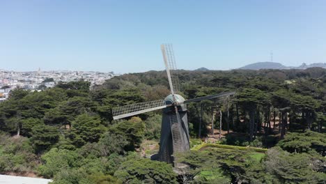 close-up panning aerial shot of the dutch windmill in golden gate park, san francisco