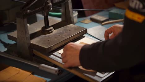 leatherworking process with a press machine