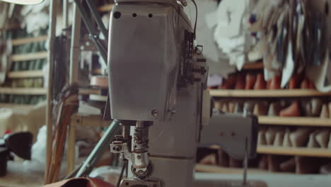 sewing machine at shoemaker workplace