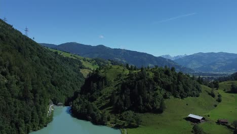 Flying-above-a-beautiful-blue-lake-in-the-Austrian-Alps