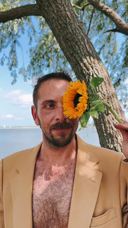 man with a sunflower