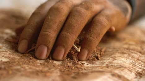 Closeup-Of-Madder-Powder-Production,-Traditionally-Used-For-Organic-Textile-Dye-In-Pakistan