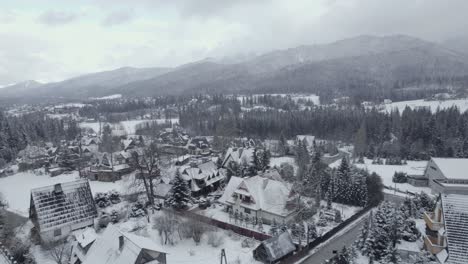 snowy mountain village aerial view