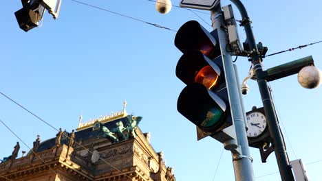 Intersection-traffic-light-change-color-from-green-to-red-in-city-of-Prague