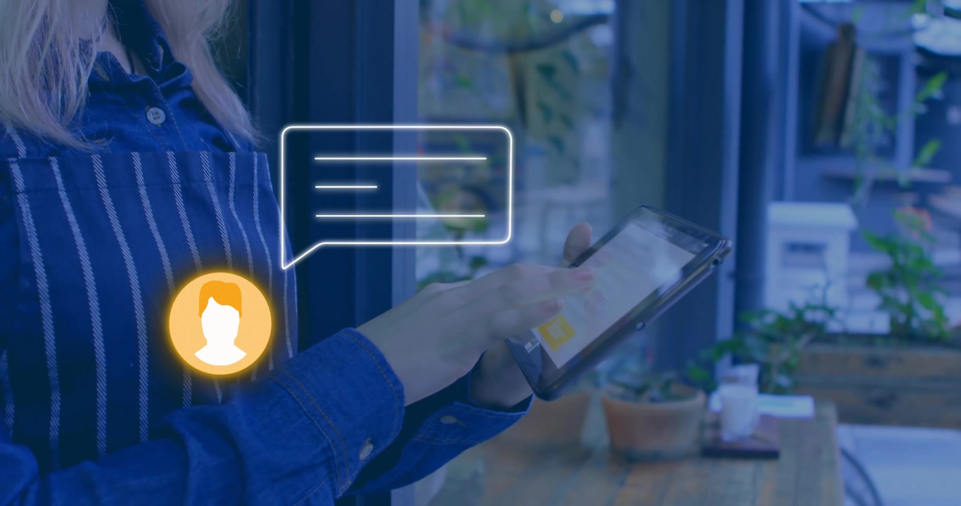 Barista holding tablet, tapping and swiping as avatar and chat bubble appearing, managing orders
