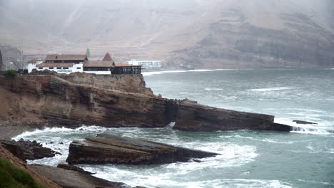 static shot of a coastal settlement in salto del fraile, chorrillos, lima, peru