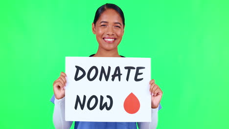 doctor, blood donation and a woman with a sign