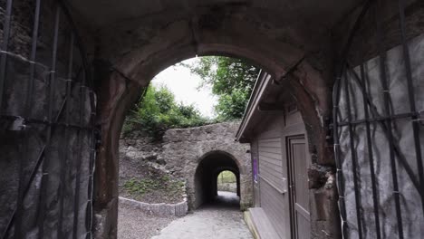 entering a short tunnel as a passageway in the castle rattenburg in austria.