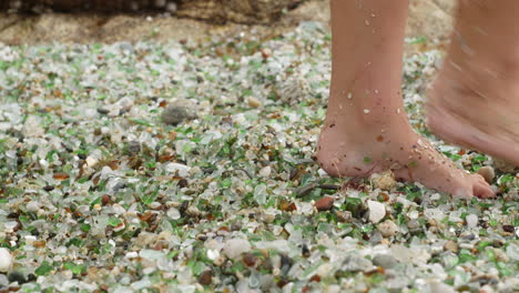 barefoot on a glass beach