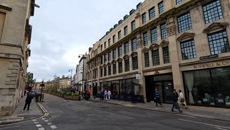 people walking near historic buildings in oxford