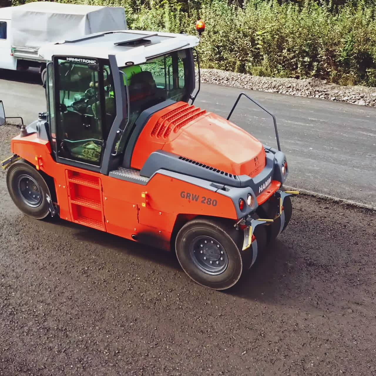 Heavy Vibration roller at asphalt pavement works. Construction of the road.