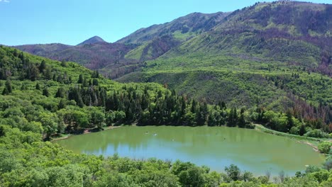 aerial shot maple lake on nebo loop up payson canyon above utah valley mountains