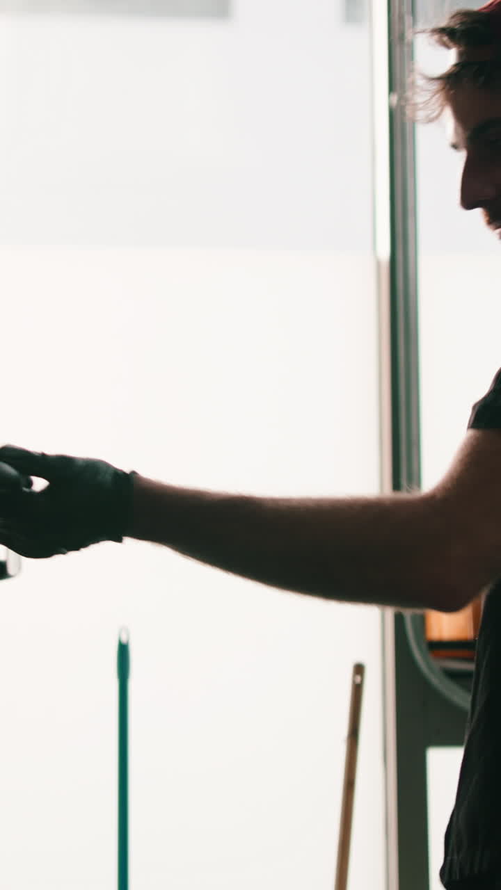 Man with red cap cooking