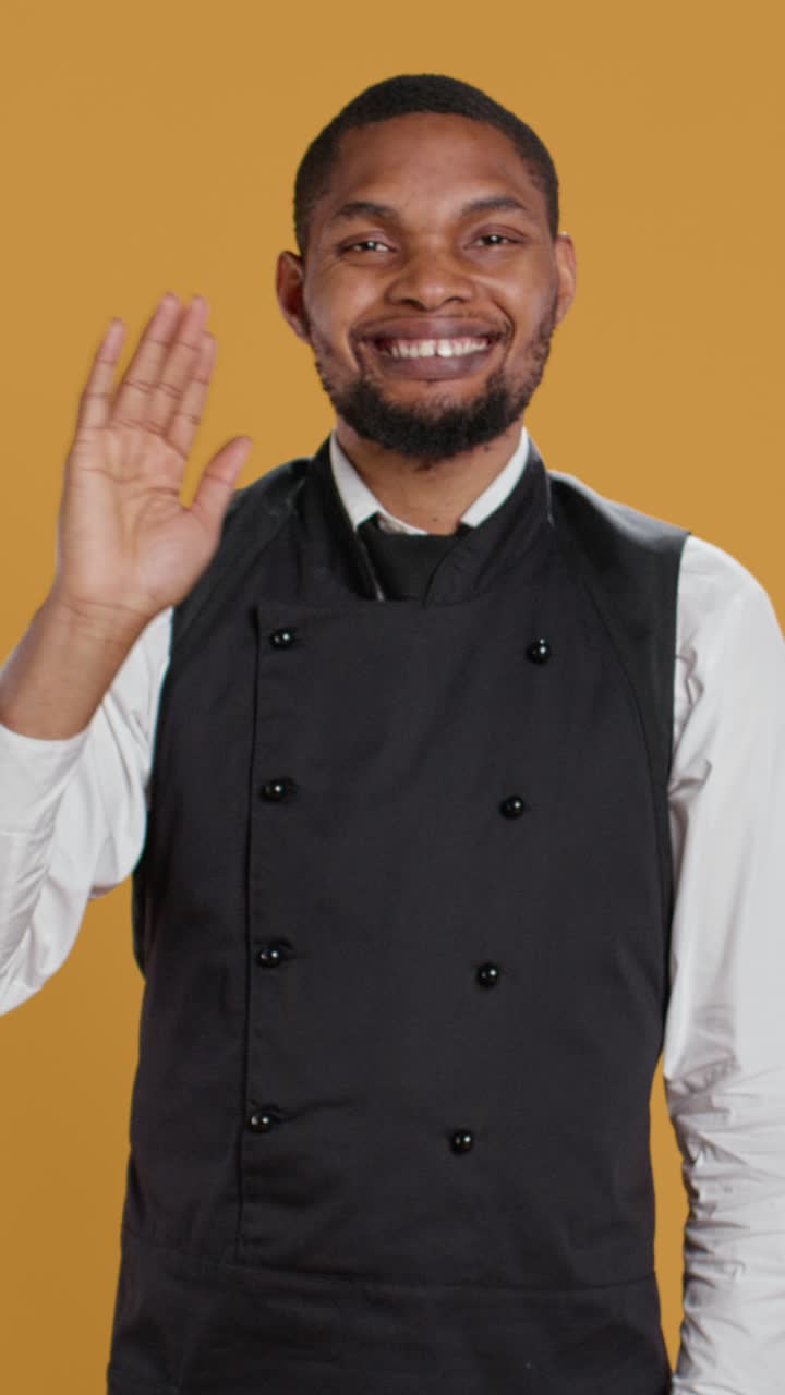 African American Chef Smiling and Waving Hello