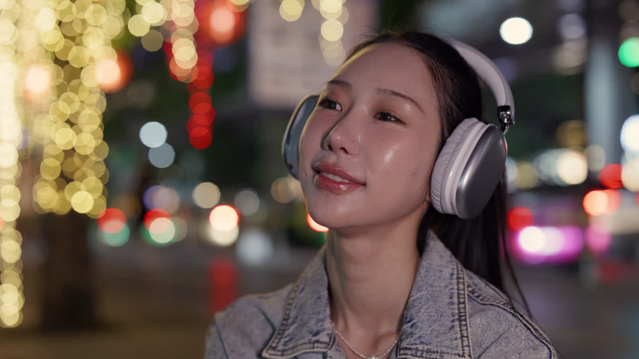 Woman Listening to Music at Night