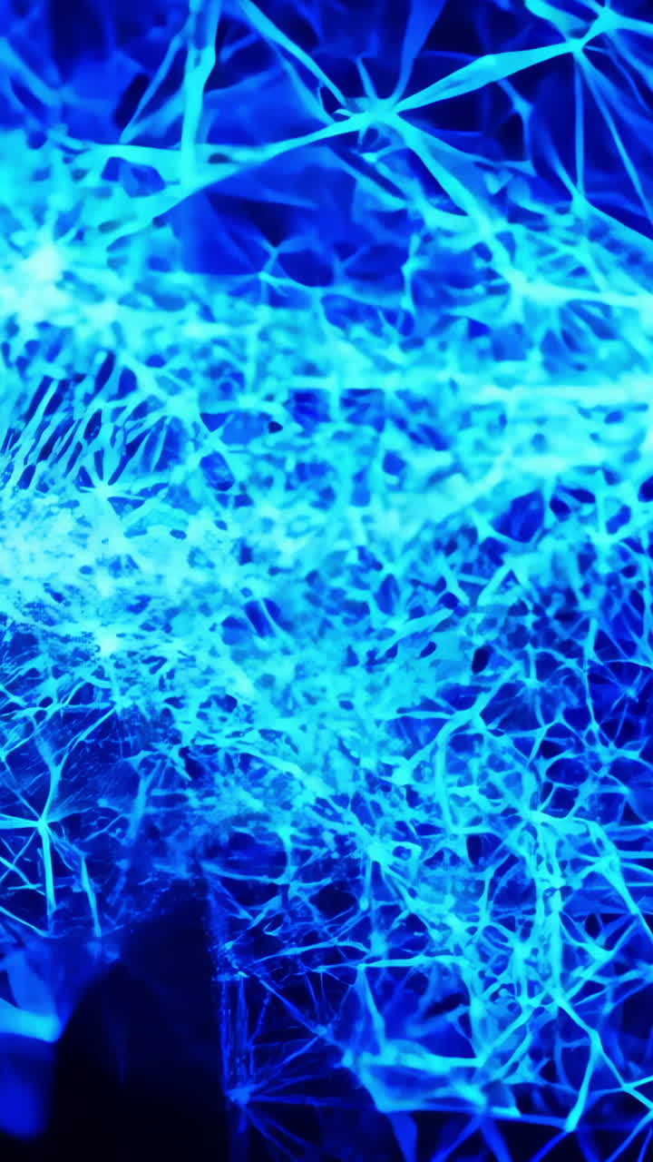 A blue object is in the center of a black background. The blue object is small and he is a star. The black background creates a sense of depth and mystery