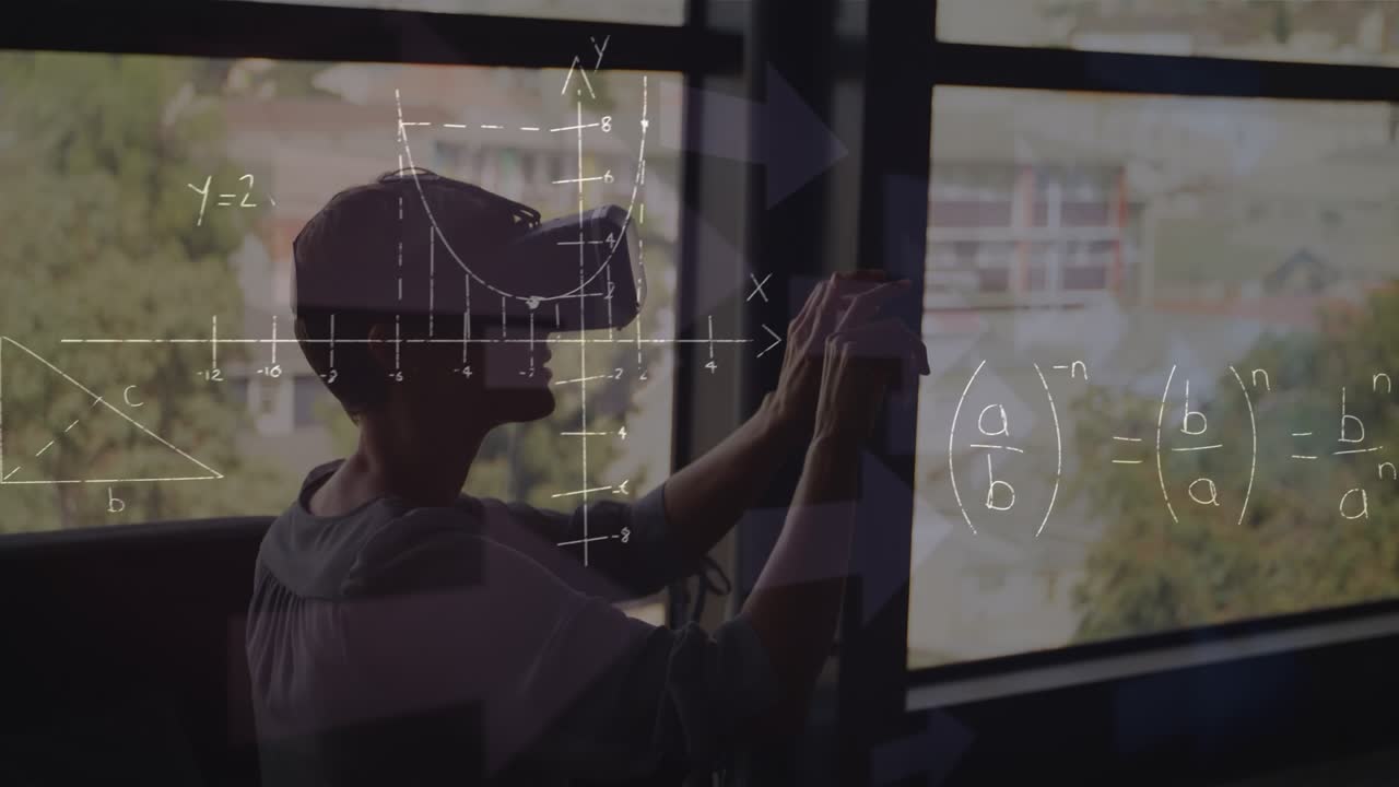 Mathematical equations floating against caucasian boy wearing vr headset in the class at school